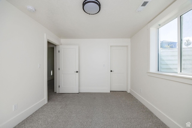 104 S 950 E, Hyde Park, UT 84318 - unfurnished bedroom featuring carpet flooring and baseboards