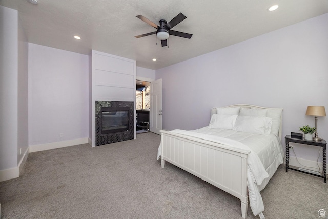 104 S 950 E, Hyde Park, UT 84318 - bedroom featuring light carpet, recessed lighting, a high end fireplace, baseboards, and ceiling fan