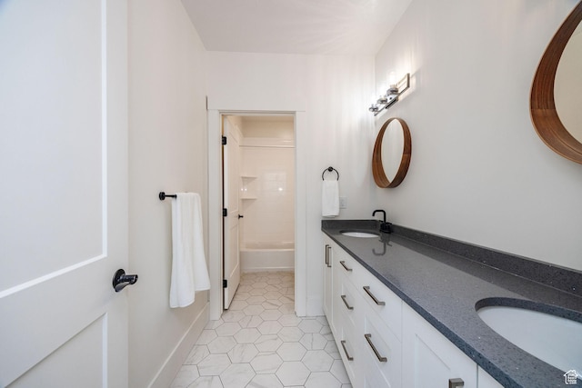 104 S 950 E, Hyde Park, UT 84318 - bathroom featuring double vanity, tile patterned floors, and shower / bath combination