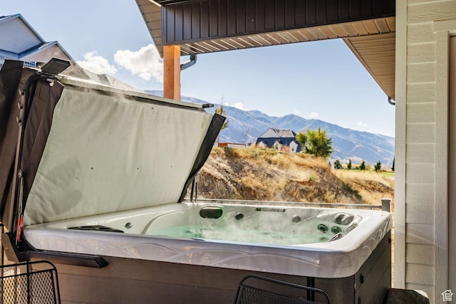 104 S 950 E, Hyde Park, UT 84318 - view of patio / terrace featuring a mountain view and a hot tub