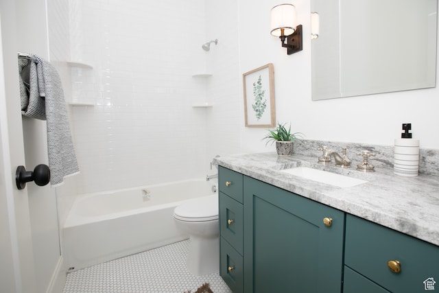 717 E Logan Ave, Salt Lake City, UT 84105 - full bathroom featuring vanity, tiled shower / bath, toilet, and tile patterned flooring