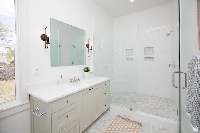 717 E Logan Ave, Salt Lake City, UT 84105 - bathroom featuring vanity, an enclosed shower, and a wealth of natural light