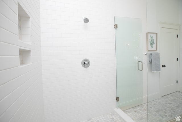 717 E Logan Ave, Salt Lake City, UT 84105 - bathroom with tile patterned floors and an enclosed shower