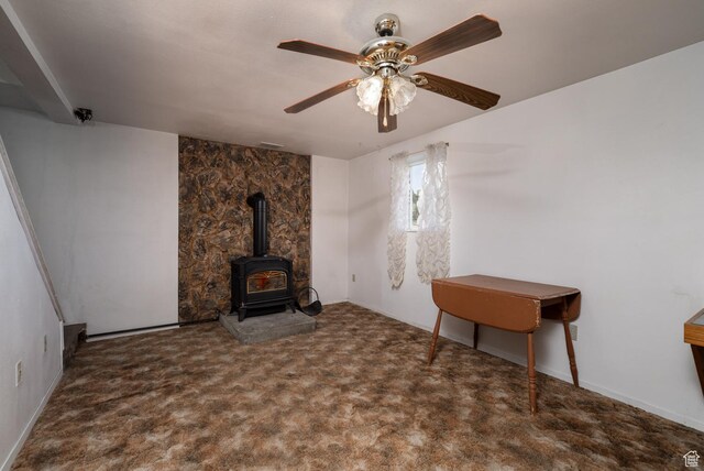 1390 N 500 W, Vernal, UT 84078 - carpeted living area with a wood stove and a ceiling fan