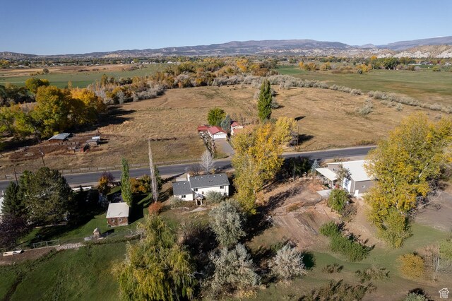 1390 N 500 W, Vernal, UT 84078 - aerial overview of property's location with mountains and rural landscape