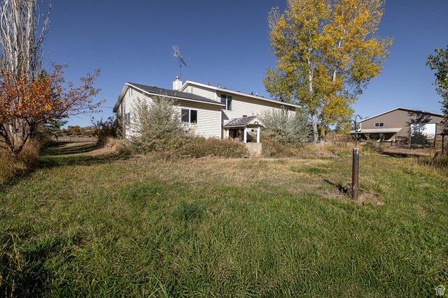 1390 N 500 W, Vernal, UT 84078 - rear view of house with a chimney