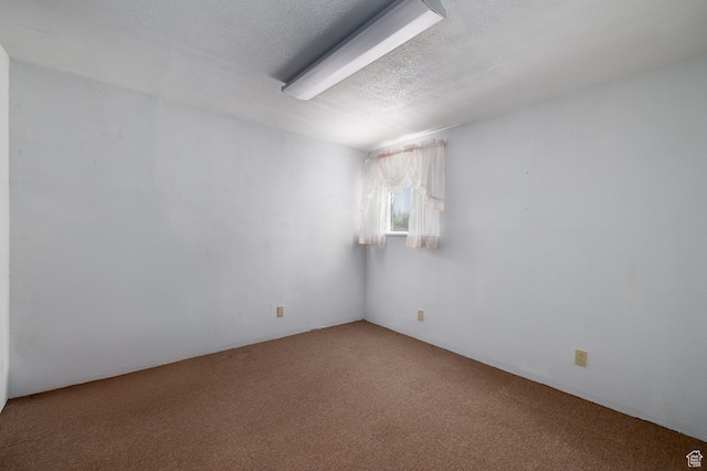 1390 N 500 W, Vernal, UT 84078 - carpeted empty room with a textured ceiling