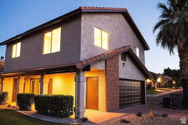 view of front of home with a garage