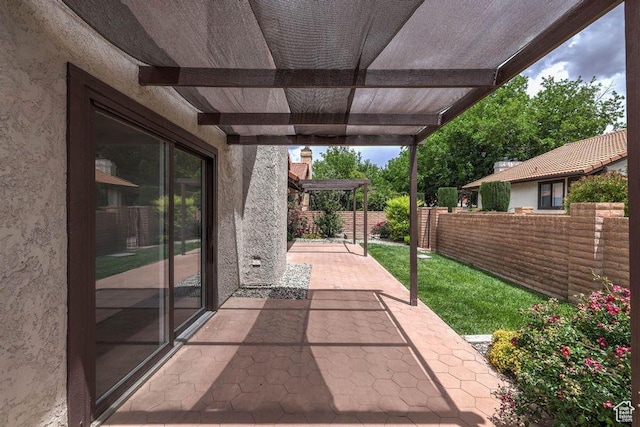 view of patio featuring a pergola