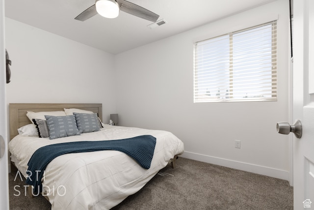 carpeted bedroom featuring ceiling fan