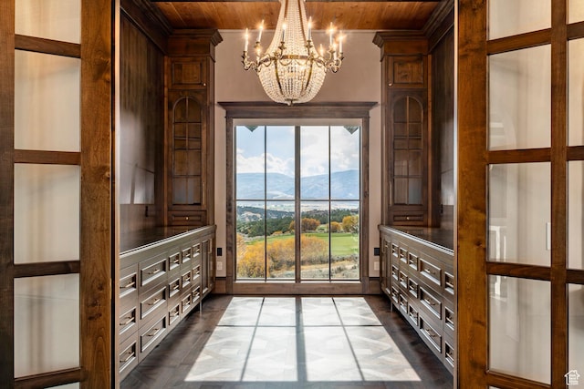 1254 N Explorer Peak Cir, Heber City, UT 84032 - doorway with a mountain view, wood ceiling, and crown molding