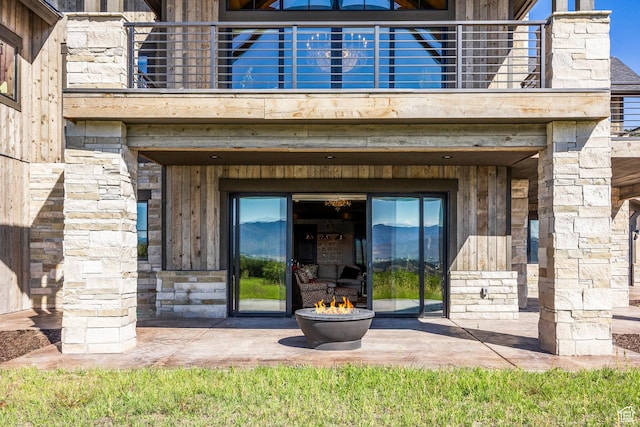 1254 N Explorer Peak Cir, Heber City, UT 84032 - entrance to property with a balcony and stone siding