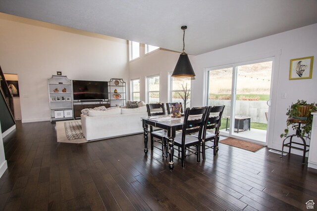 520 N 900 E, Hyde Park, UT 84318 - dining space with dark wood-type flooring and baseboards