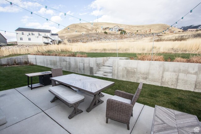 520 N 900 E, Hyde Park, UT 84318 - view of patio / terrace featuring outdoor dining space, stairs, and a mountain view