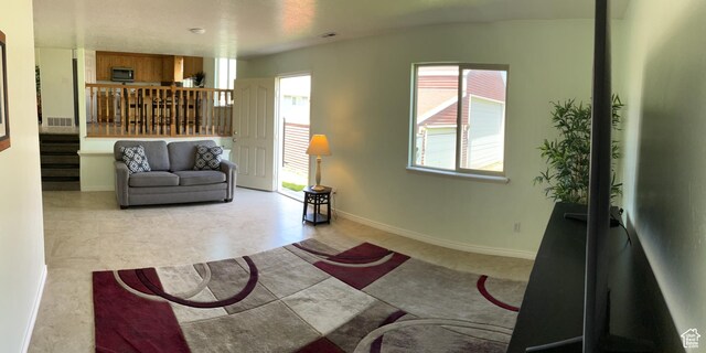 642 W 1150th St S, Provo, UT 84601 - living area featuring baseboards and stairway