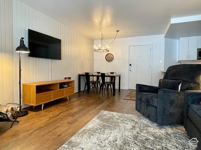 385 S Vasels Rd Unit 21, Brian Head, UT 84719 - living area featuring wood finished floors and a chandelier