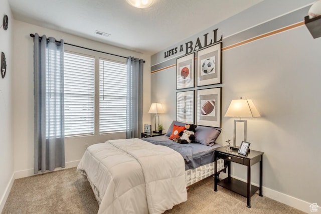 11211 S Clear Blue Dr, South Jordan, UT 84009 - carpeted bedroom featuring multiple windows and baseboards