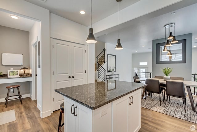 11211 S Clear Blue Dr, South Jordan, UT 84009 - kitchen featuring light wood-type flooring, white cabinetry, pendant lighting, and recessed lighting