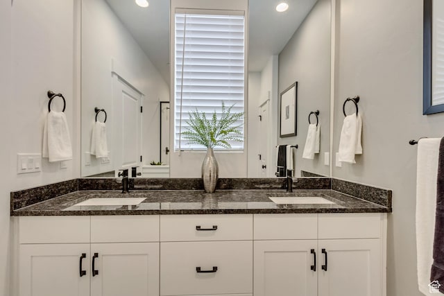 11211 S Clear Blue Dr, South Jordan, UT 84009 - bathroom with double vanity and recessed lighting