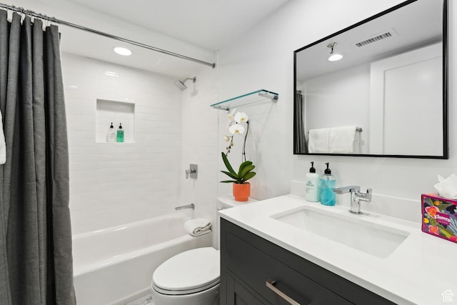 bathroom with visible vents, shower / bath combo, vanity, toilet, and recessed lighting
