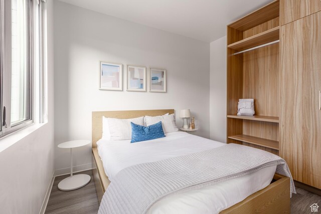2670 W Canyons Resort Dr Unit 436, Park City, UT 84098 - bedroom with baseboards and wood finished floors