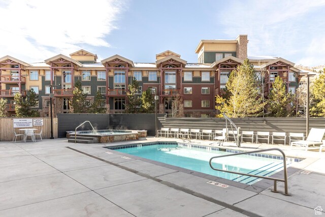 2670 W Canyons Resort Dr Unit 436, Park City, UT 84098 - community pool featuring a hot tub and a patio area