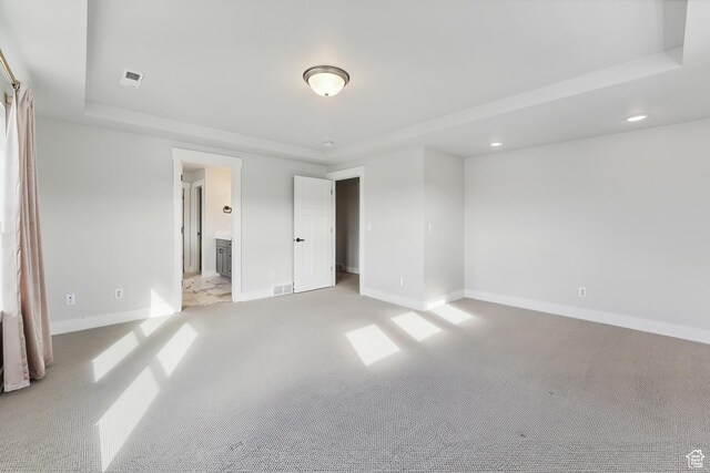 1358 S 1140 E, Heber City, UT 84032 - unfurnished bedroom with a tray ceiling, light colored carpet, baseboards, ensuite bathroom, and recessed lighting