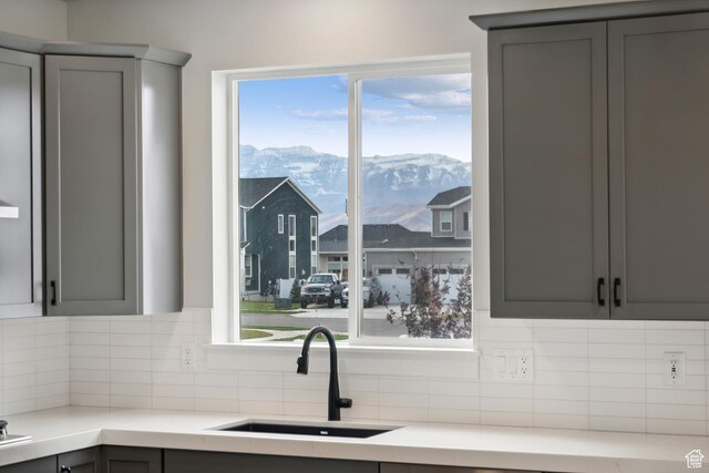 1358 S 1140 E, Heber City, UT 84032 - kitchen featuring a sink, gray cabinets, a mountain view, tasteful backsplash, and light countertops