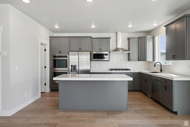 1358 S 1140 E, Heber City, UT 84032 - kitchen featuring stainless steel appliances, wall chimney range hood, gray cabinets, a center island, and recessed lighting