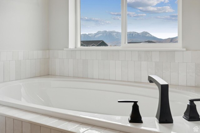 1358 S 1140 E, Heber City, UT 84032 - bathroom featuring a bath, a mountain view, and plenty of natural light