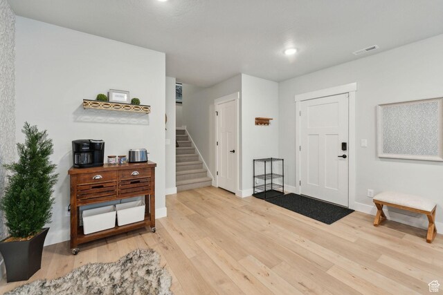 1358 S 1140 E, Heber City, UT 84032 - foyer featuring wood finished floors, stairs, baseboards, and recessed lighting