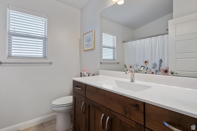 2084 E Sunshine Trl, St George, UT 84790 - full bathroom featuring baseboards, toilet, tile patterned flooring, vanity, and a shower with shower curtain