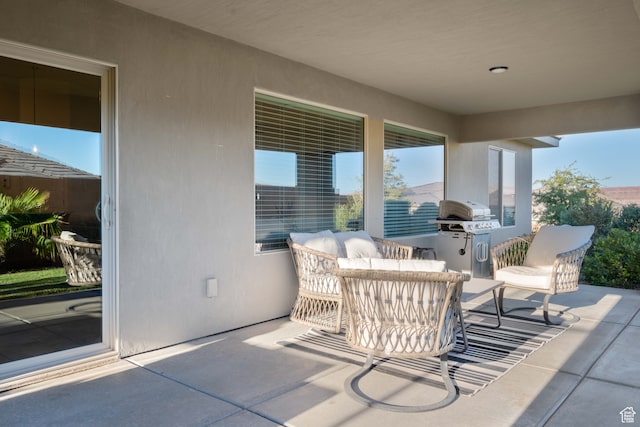 view of patio featuring a grill