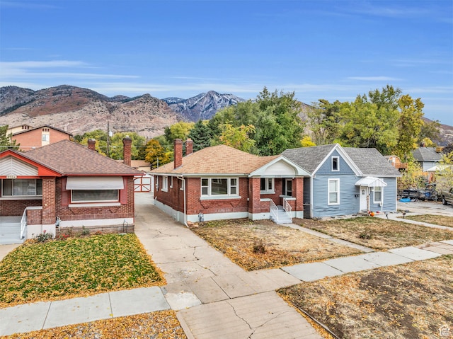 ranch-style home featuring a mountain view