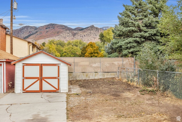 view of outbuilding with a mountain view