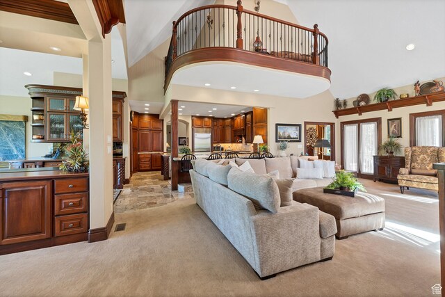 301 S Rachel Ln, New Harmony, UT 84757 - living room featuring high vaulted ceiling, light carpet, and recessed lighting