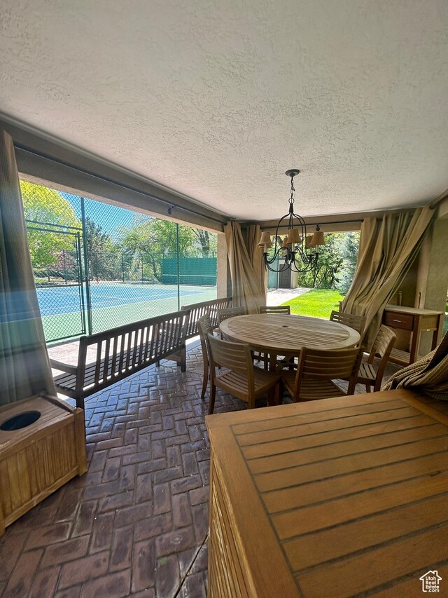 301 S Rachel Ln, New Harmony, UT 84757 - sunroom featuring a chandelier