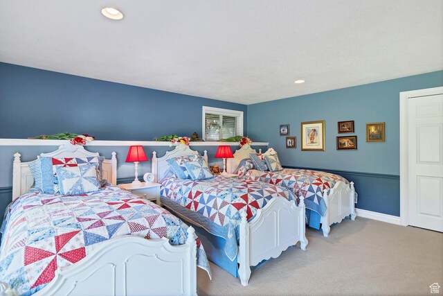 301 S Rachel Ln, New Harmony, UT 84757 - bedroom with light carpet, recessed lighting, and baseboards