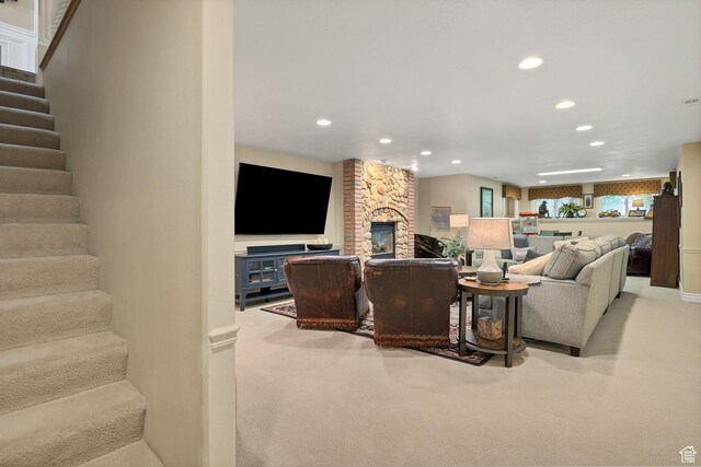301 S Rachel Ln, New Harmony, UT 84757 - living area with recessed lighting, stairway, light colored carpet, and a fireplace