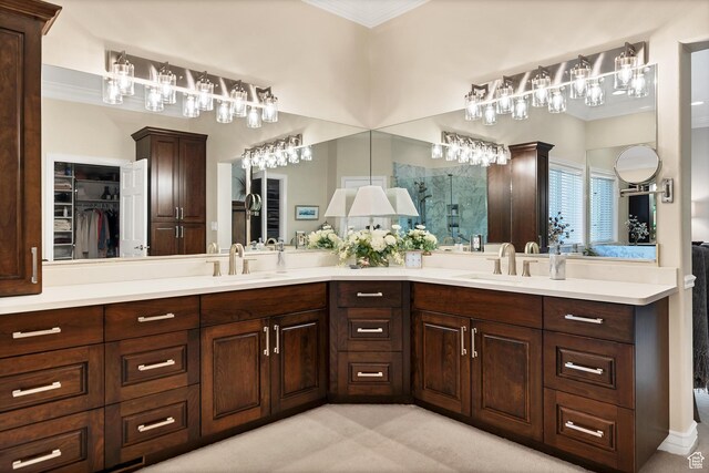 301 S Rachel Ln, New Harmony, UT 84757 - bathroom with crown molding, double vanity, a shower stall, and a walk in closet