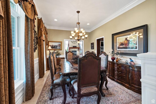 301 S Rachel Ln, New Harmony, UT 84757 - dining room with a chandelier, ornamental molding, light wood-style floors, a fireplace, and recessed lighting