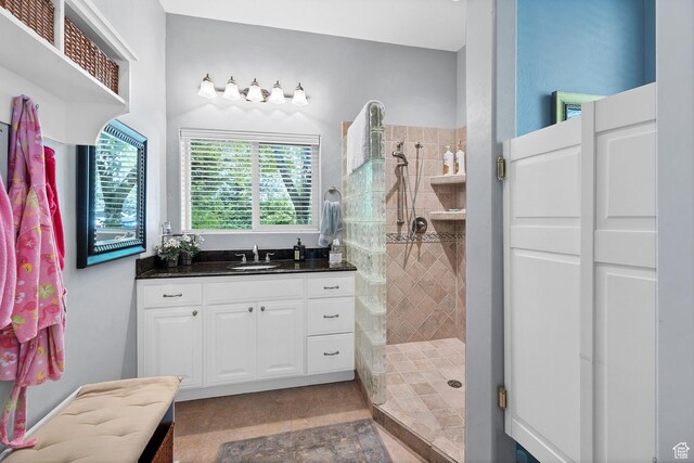 301 S Rachel Ln, New Harmony, UT 84757 - bathroom featuring tiled shower and vanity