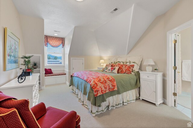 301 S Rachel Ln, New Harmony, UT 84757 - bedroom with vaulted ceiling, light carpet, and baseboards