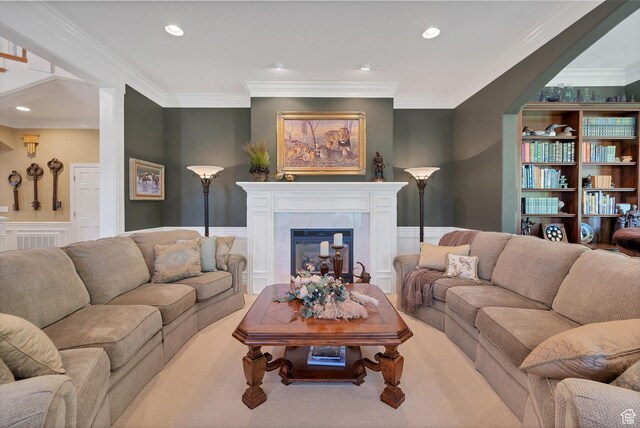 301 S Rachel Ln, New Harmony, UT 84757 - carpeted living area with crown molding, a wainscoted wall, and a fireplace
