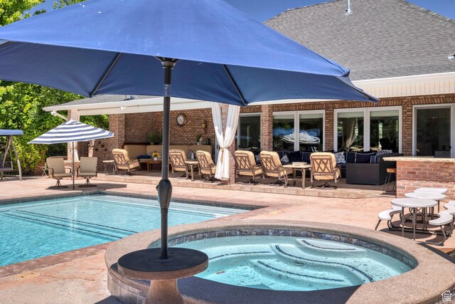 301 S Rachel Ln, New Harmony, UT 84757 - outdoor pool featuring a patio area, an outdoor hangout area, and an in-ground hot tub