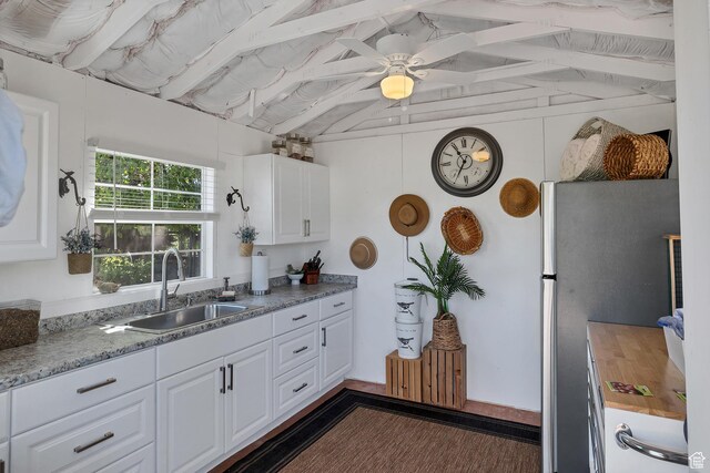 301 S Rachel Ln, New Harmony, UT 84757 - kitchen with a sink, white cabinets, freestanding refrigerator, and ceiling fan