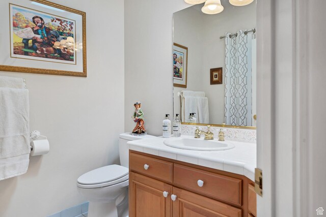 301 S Rachel Ln, New Harmony, UT 84757 - bathroom featuring toilet, vanity, and tile patterned floors