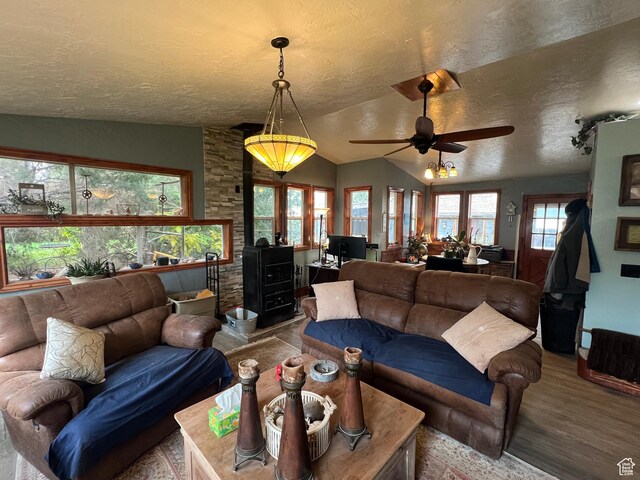 295 N 200 W, Monroe, UT 84754 - living room featuring a ceiling fan, wood finished floors, a textured ceiling, and vaulted ceiling