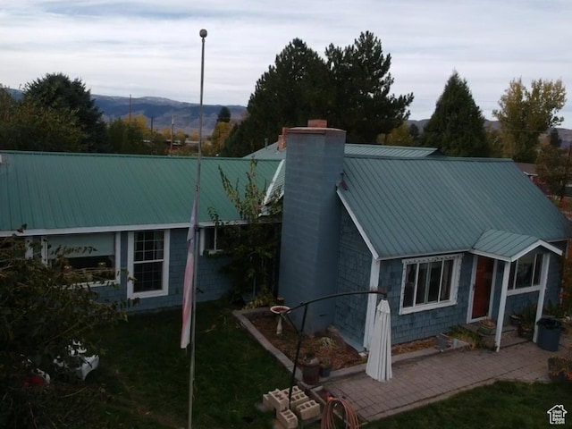 295 N 200 W, Monroe, UT 84754 - view of front of property featuring metal roof, a mountain view, and a chimney