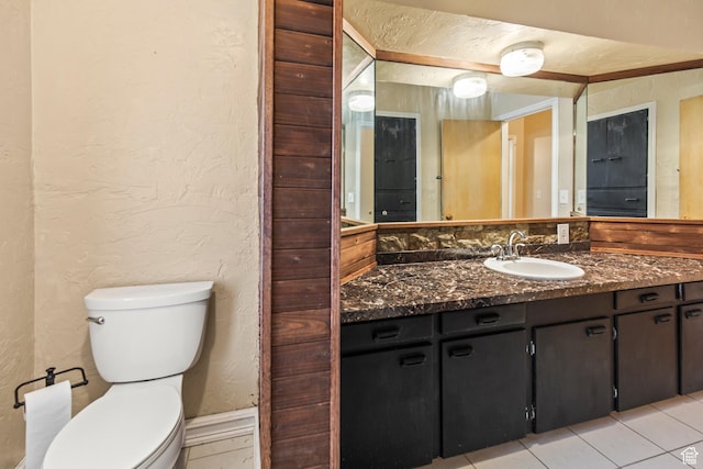 455 N 500 W, Richfield, UT 84701 - half bathroom with a textured wall, vanity, toilet, and tile patterned floors